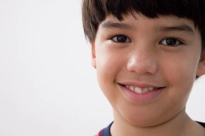 Framed Print : Portrait of a boy smiling Framed Print : Portrait of a boy smiling
