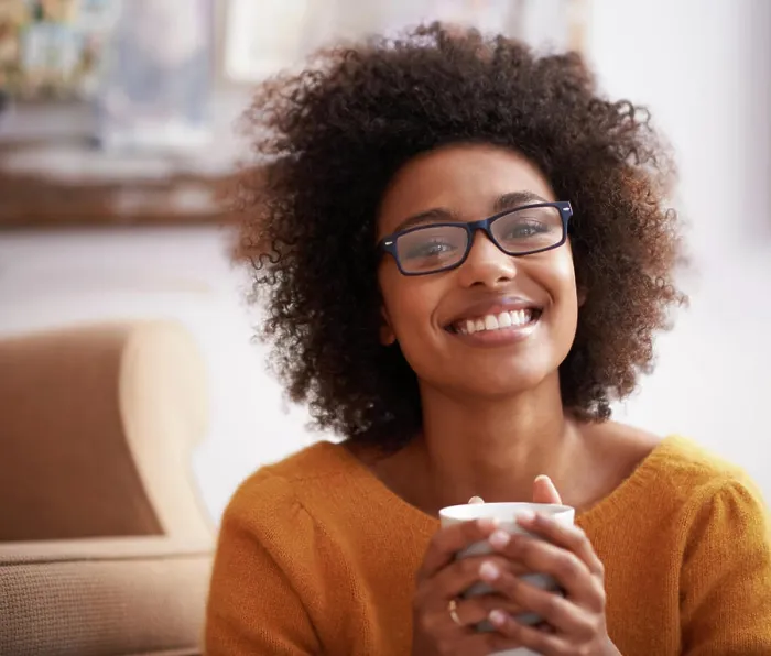 Framed Print : Portrait, coffee and happy woman in home lounge