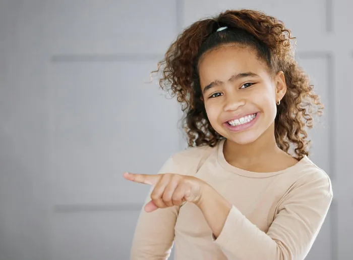 Framed Print : Portrait, girl and pointing with smile Framed Print : Portrait, girl and pointing with smile