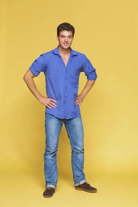 Framed Print : Portrait handsome man in blue on yellow background