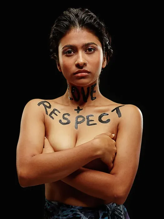 Framed Print : Portrait of Indian woman with arms crossed and words painted across neck and chest Love + Respect Framed Print : Portrait of Indian woman with arms crossed and words painted across neck and chest Love + Respect