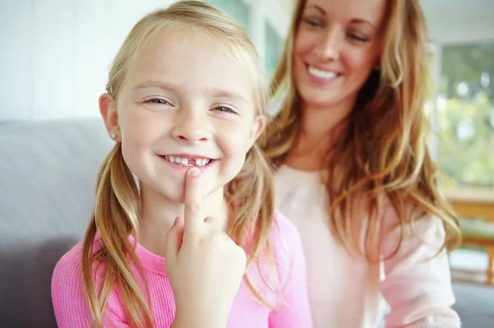 Framed Print : Portrait, mom and girl with tooth gap Framed Print : Portrait, mom and girl with tooth gap