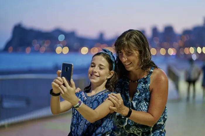 Framed Print : Portrait of mother and teenage daughter wearing blue dresses Framed Print : Portrait of mother and teenage daughter wearing blue dresses