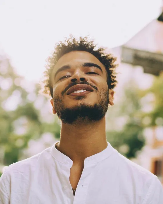 Framed Print : Portrait of smiling young man in casuals during sunny day Framed Print : Portrait of smiling young man in casuals during sunny day