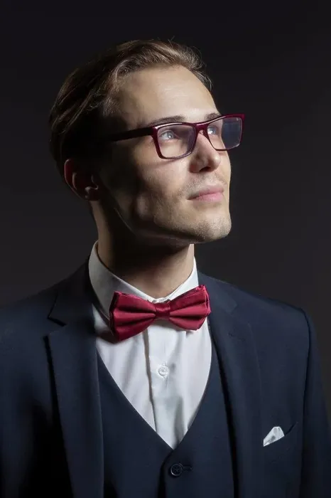 Framed Print : Portrait thoughtful, handsome young man in suit and eyeglasses