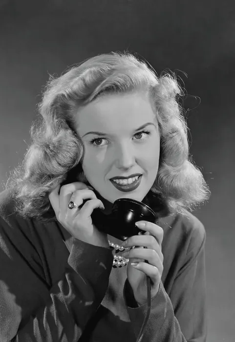 Framed Print : Portrait of woman talking on phone