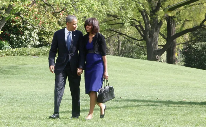 Framed Print : President Barack Obama and First Lady Michelle Obama arrive at the White House on April 18, 2013