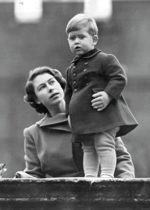 Framed Print : The Princess Watches As Queen Juliana Visits The City -- Warmly wrapped little Prince Charles Framed Print : The Princess Watches As Queen Juliana Visits The City -- Warmly wrapped little Prince Charles