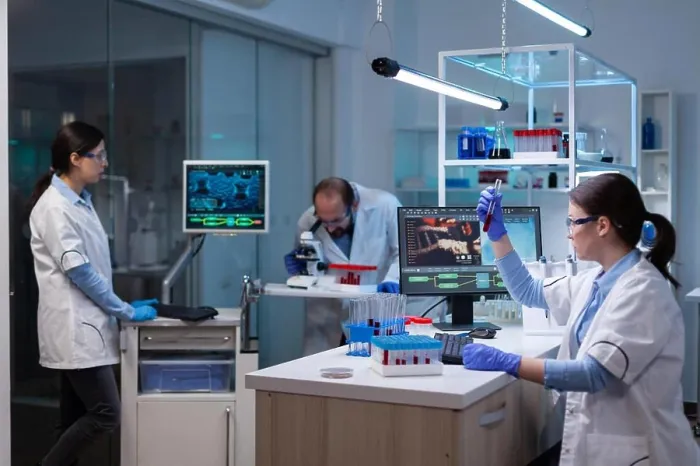 Framed Print : Professional doctor scientist looking in computer analysing DNA image scan Framed Print : Professional doctor scientist looking in computer analysing DNA image scan