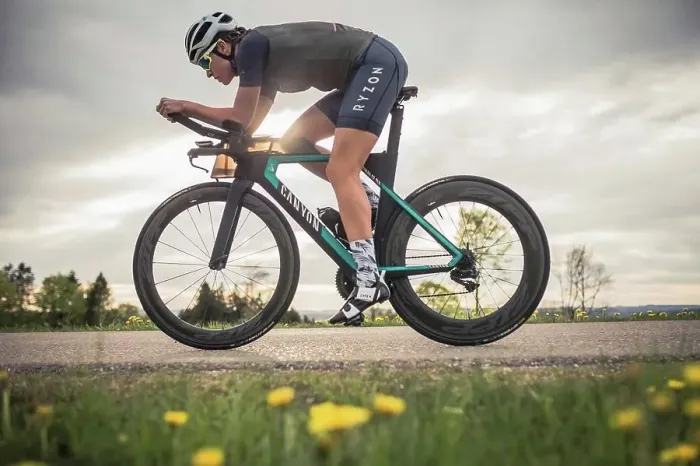 Framed Print : Professional triathlete on her road bike, time trial bike round, Auerberg, Allgäu, Bavaria, Germany