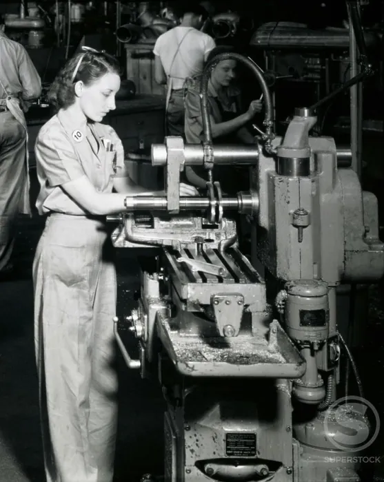 Framed Print : Side profile of a female worker working on a machine in an assembly plant, Vultee Aircraft, 1941 Framed Print : Side profile of a female worker working on a machine in an assembly plant, Vultee Aircraft, 1941