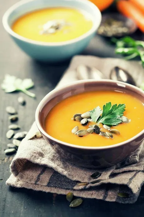 Framed Print : Pumpkin soup in a bowl on a wooden surface Framed Print : Pumpkin soup in a bowl on a wooden surface