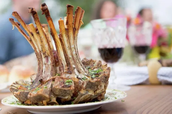 Framed Print : Rack of lamb on plate at family meal, close-up Framed Print : Rack of lamb on plate at family meal, close-up