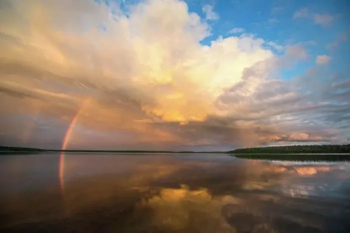 Framed Print : A rainbow and a dramatic cloud formation over a lake Framed Print : A rainbow and a dramatic cloud formation over a lake