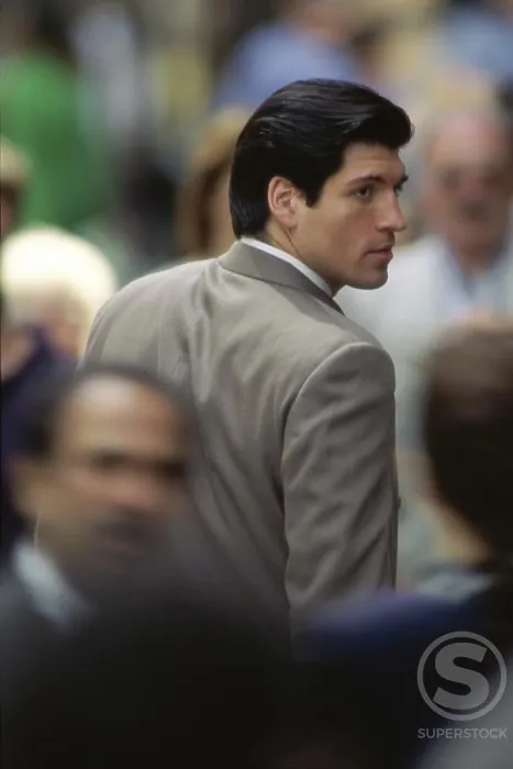 Framed Print : Rear view of a businessman looking away Framed Print : Rear view of a businessman looking away