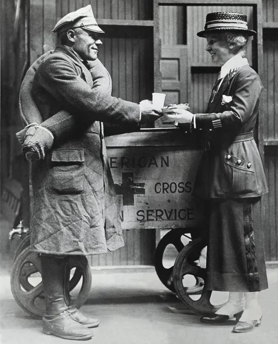 Framed Print : Red Cross worker giving food to a Polish-American soldier, 1918 Framed Print : Red Cross worker giving food to a Polish-American soldier, 1918