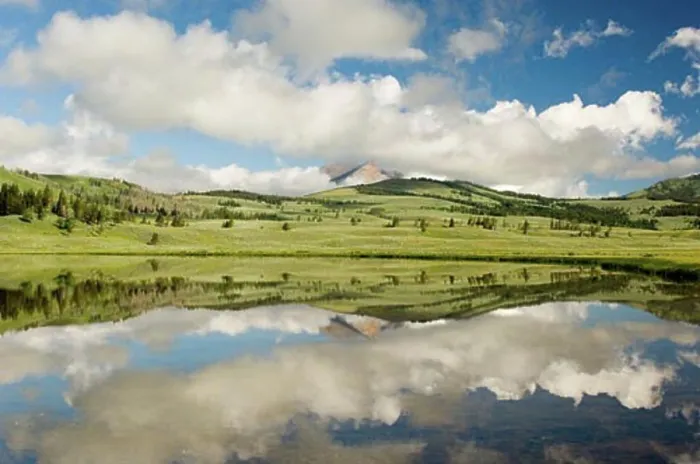 Framed Print : Reflection of clouds in water, Yellowstone National Park, Wyoming, USA Framed Print : Reflection of clouds in water, Yellowstone National Park, Wyoming, USA