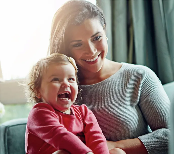 Framed Print : Relax, happy and laughing with mother and baby on sofa for bonding Framed Print : Relax, happy and laughing with mother and baby on sofa for bonding