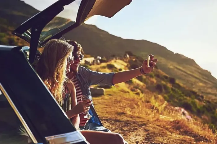 Framed Print : Roadtripping. a happy young couple posing for a selfie with their car on a roadtrip Framed Print : Roadtripping. a happy young couple posing for a selfie with their car on a roadtrip