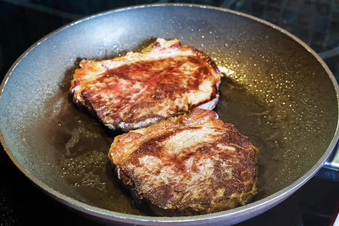 Framed Print : two roasted piece of meat in frying pan on range two roasted piece of meat in frying pan on ceramic electric range Framed Print : two roasted piece of meat in frying pan on range two roasted piece of meat in frying pan on ceramic electric range
