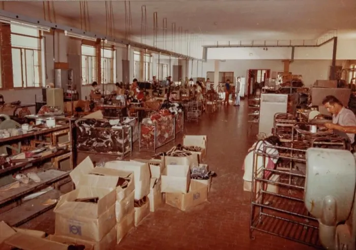 Framed Print : Rome, Italy may 1964: Shoemakers working diligently in a bustling shoe factory Framed Print : Rome, Italy may 1964: Shoemakers working diligently in a bustling shoe factory