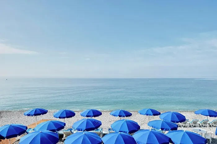 Framed Print : Rows of blue beach umbrellas, Nice, Cote d'azur, France Framed Print : Rows of blue beach umbrellas, Nice, Cote d'azur, France