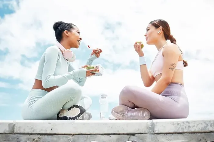 Framed Print : Salad, apple and fitness friends eating food outdoor for wellness