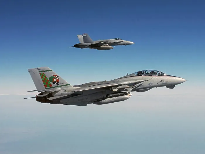 Framed Print : Santa Claus inspired tail design on an F-14, with an F / A-18 wingman flying alongside Framed Print : Santa Claus inspired tail design on an F-14, with an F / A-18 wingman flying alongside