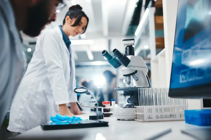 Framed Print : Scientist, laboratory and woman with microscope for research