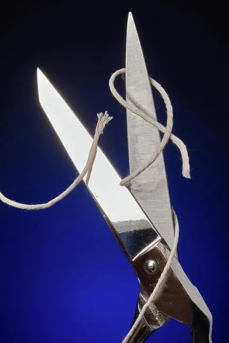 Framed Print : Scissors cutting twine into pieces