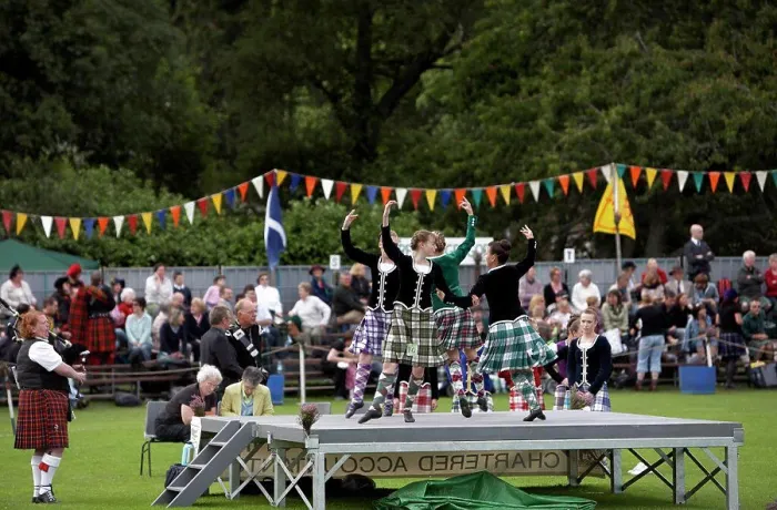 Framed Print : Scotland, Aberdeenshire, Strathdon. Female highland dancers performing for the crowds at the Lonach Highland Games Framed Print : Scotland, Aberdeenshire, Strathdon. Female highland dancers performing for the crowds at the Lonach Highland Games