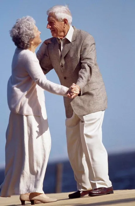 Framed Print : Senior couple dancing on a pier Framed Print : Senior couple dancing on a pier