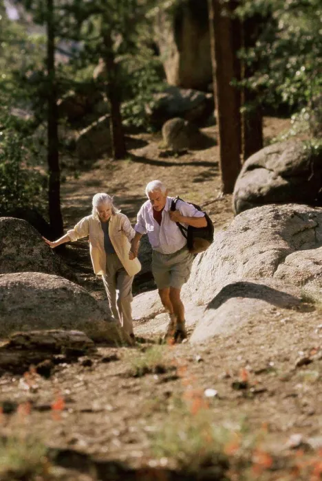 Framed Print : Senior couple hiking