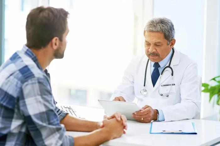 Framed Print : Senior doctor tablet, man patient and results with medical consultation and discussion in clinic