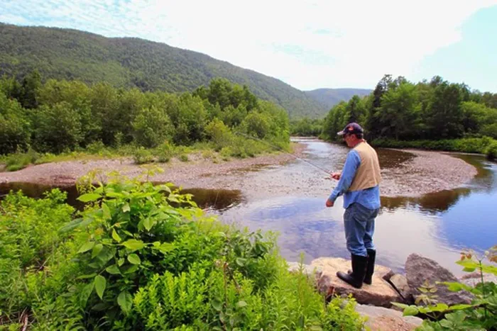 Framed Print : Senior man fly-fishing in a stream, Cape Breton Highlands National Park, Cape Breton Island, Nova Scotia, Canada