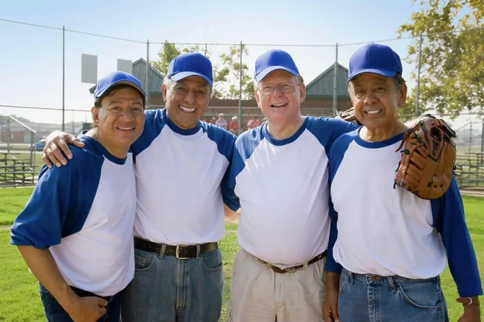 Framed Print : Senior men playing on baseball team