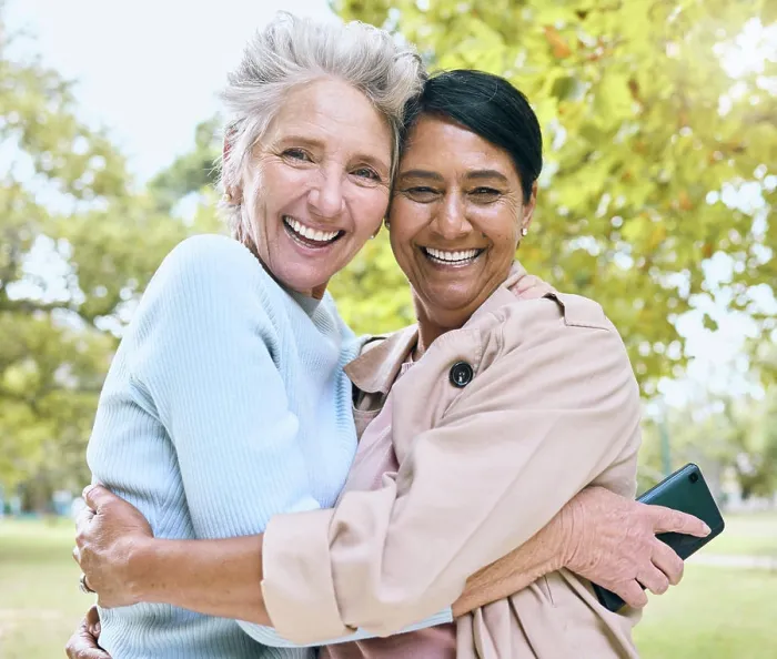 Framed Print : Senior women, bonding or hug portrait in nature park Framed Print : Senior women, bonding or hug portrait in nature park