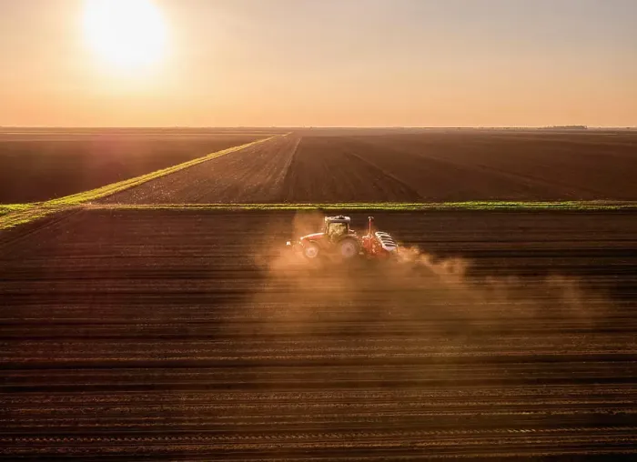 Framed Print : Serbia, VojvodinaProvince, Aerial view of tractor sowing seeds at sunset Framed Print : Serbia, VojvodinaProvince, Aerial view of tractor sowing seeds at sunset