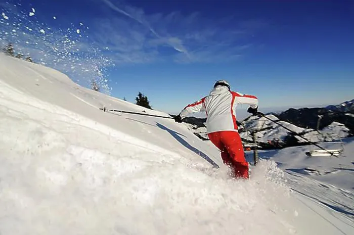 Framed Print : Skier skiing through powder snow on the Kitzlahner-Hang run Framed Print : Skier skiing through powder snow on the Kitzlahner-Hang run
