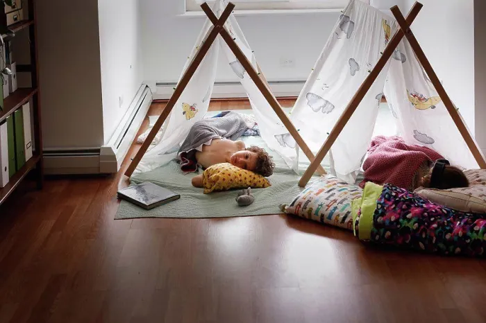 Framed Print : Two sleeping kids inside in tents Framed Print : Two sleeping kids inside in tents