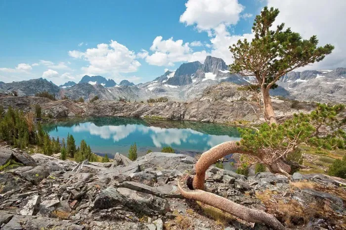 Framed Print : Small lake surrounded by mountains