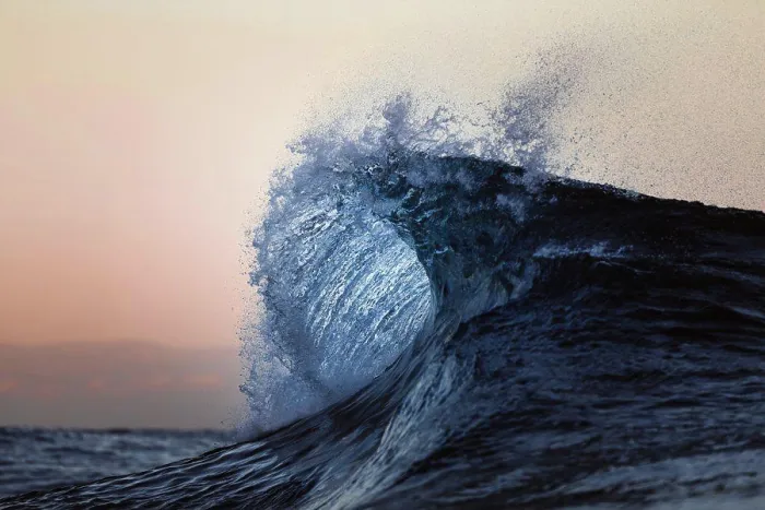 Framed Print : Small wave breaking during sunrise