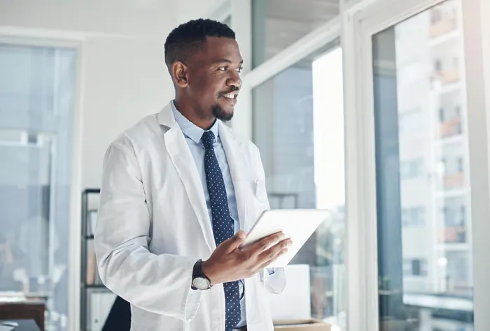 Framed Print : Smile, doctor and black man with tablet Framed Print : Smile, doctor and black man with tablet