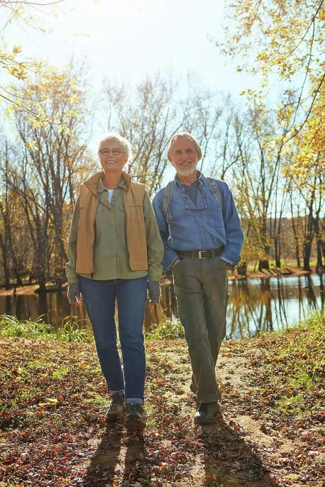 Framed Print : Smile, nature and senior couple in forest with backpack for walk Framed Print : Smile, nature and senior couple in forest with backpack for walk