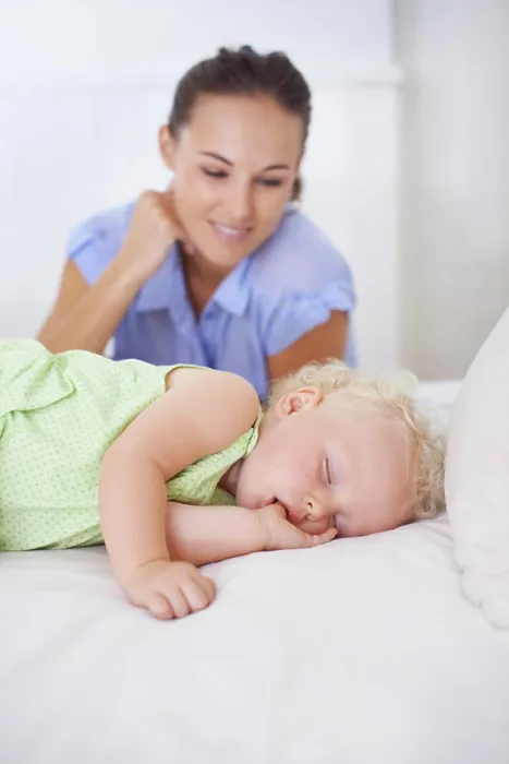 Framed Print : Smile, sleeping and mother with baby on bed for bonding