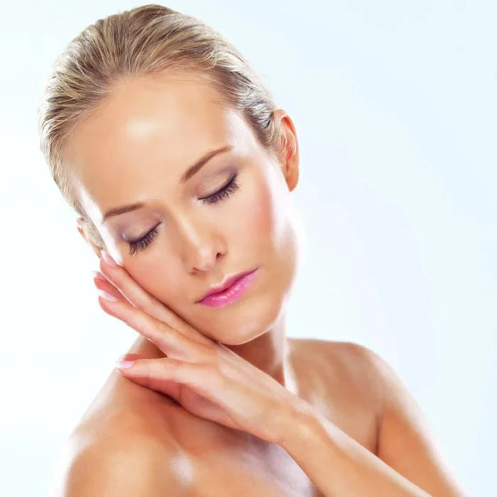 Framed Print : Soft, makeup and calm woman with hands on face in studio for wellness Framed Print : Soft, makeup and calm woman with hands on face in studio for wellness