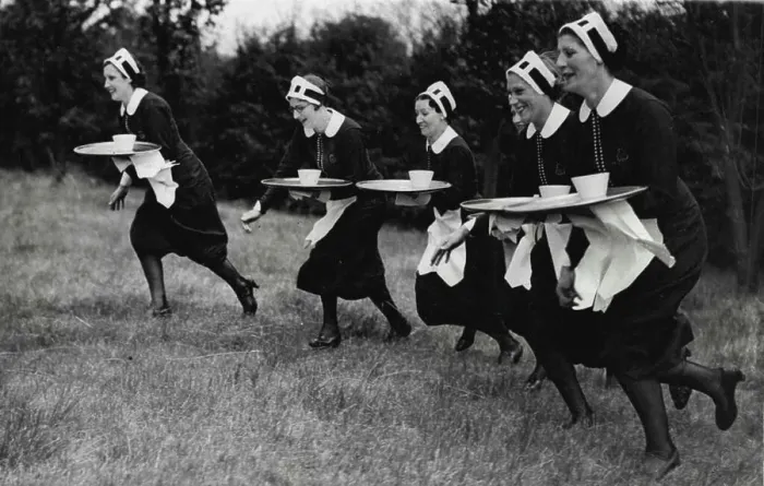 Framed Print : Sports Carnival At Sudbury.Waitresses carrying plays during the 'Nippies' race. August 30, 1937. (Photo by Keystone) Framed Print : Sports Carnival At Sudbury.Waitresses carrying plays during the 'Nippies' race. August 30, 1937. (Photo by Keystone)