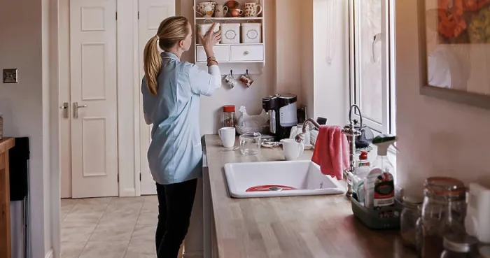 Framed Print : Spring cleaning, kitchen and woman cleaner doing house work in a home for hygiene
