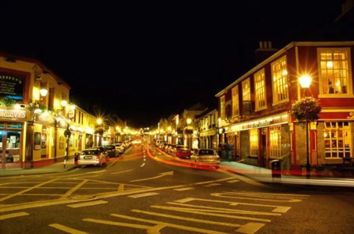 Framed Print : Stores lit up at night, Westport, Ireland