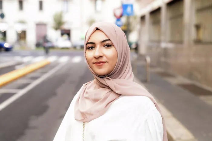 Framed Print : Street portrait of young woman wearing hijab